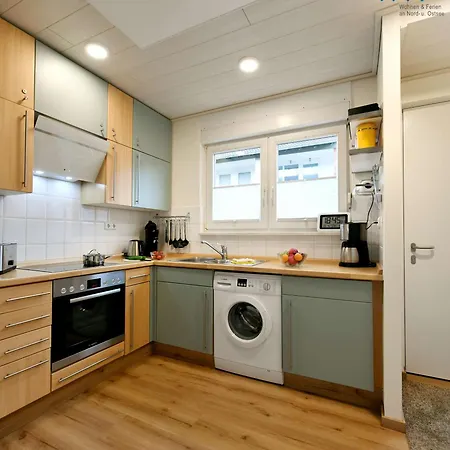 Ferienhaeuser Siedlerstrasse 11 Nordseeglueck Holiday home *